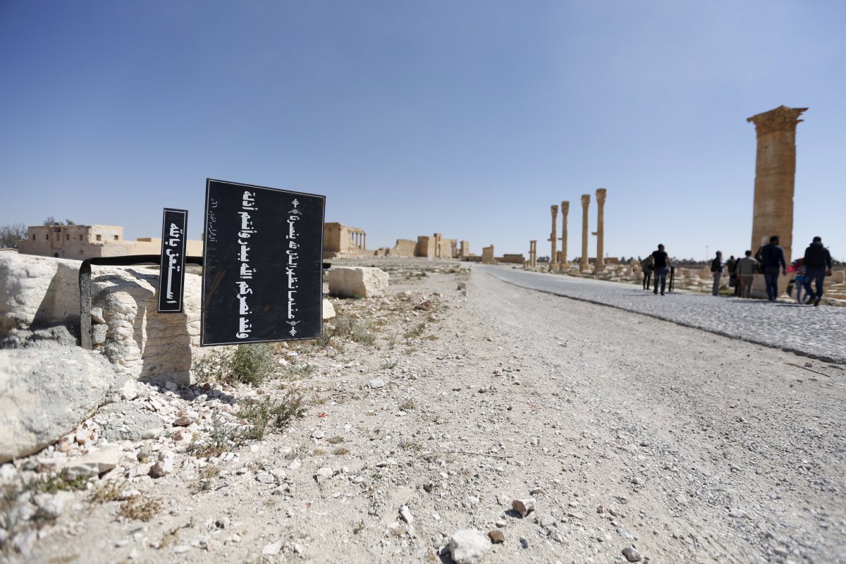 in-much-of-its-territory-isis-has-its-own-propaganda-posted-to-show-the-people-whos-in-charge-like-this-billboard-with-quranic-verses-in-the-historic-city-of-palmyra-syria