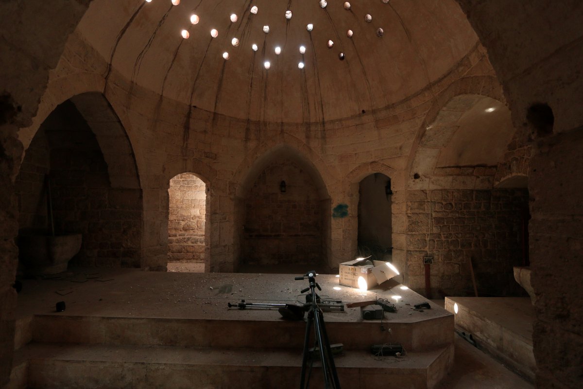 tripods-and-a-projector-were-left-inside-an-ancient-hammam-or-steam-bath-which-was-used-by-isis-as-a-media-center-in-manbij-syria